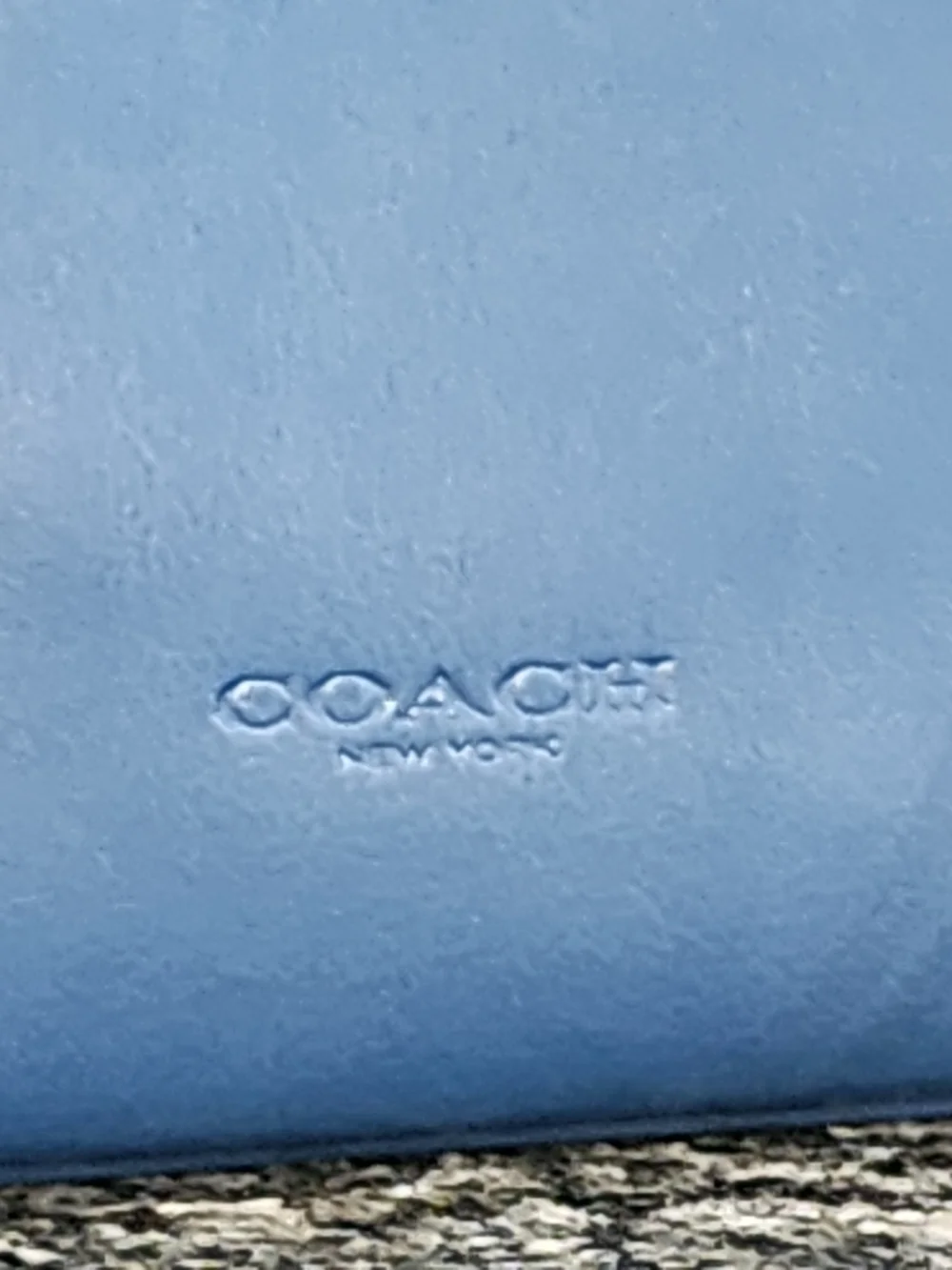 Coach Bazooka Embossed Logo Leather Wristlet- Great Condition.